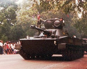 PT-76 dalam defile HUT ABRI 1978. Terlihat meriam belum mengalami retrofit